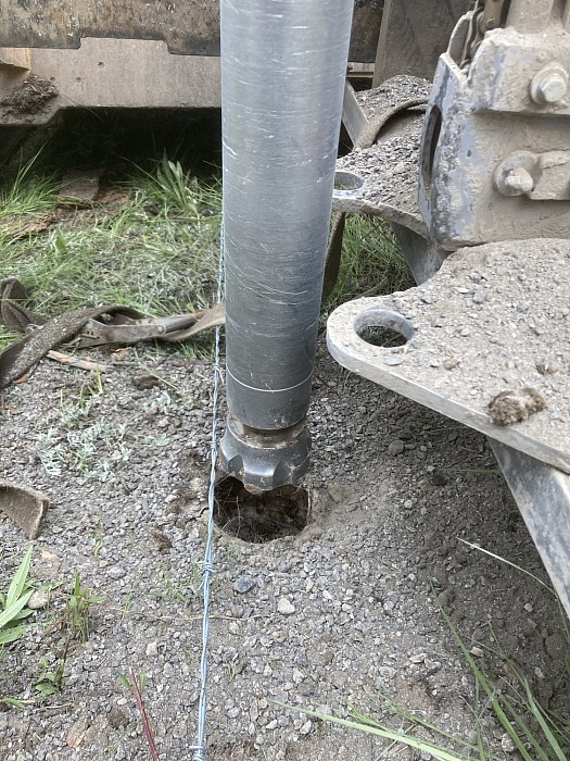 Fencing in shop rocky ground